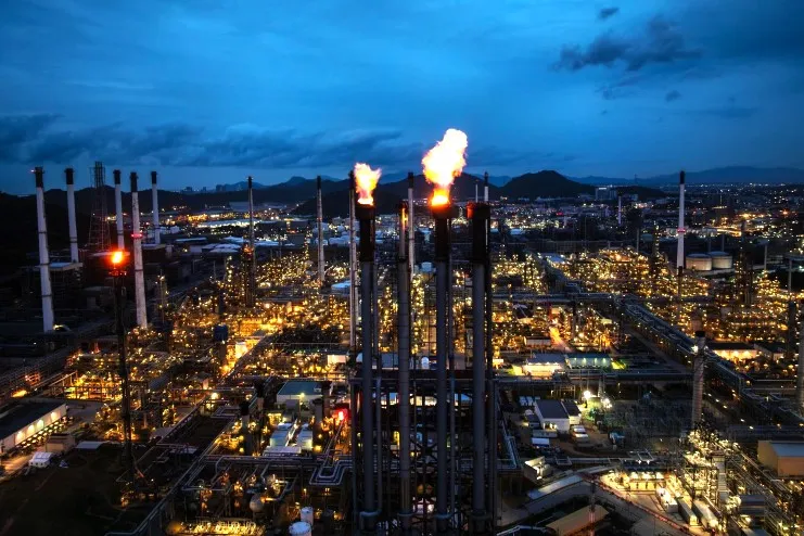 Industrial process facility at dusk